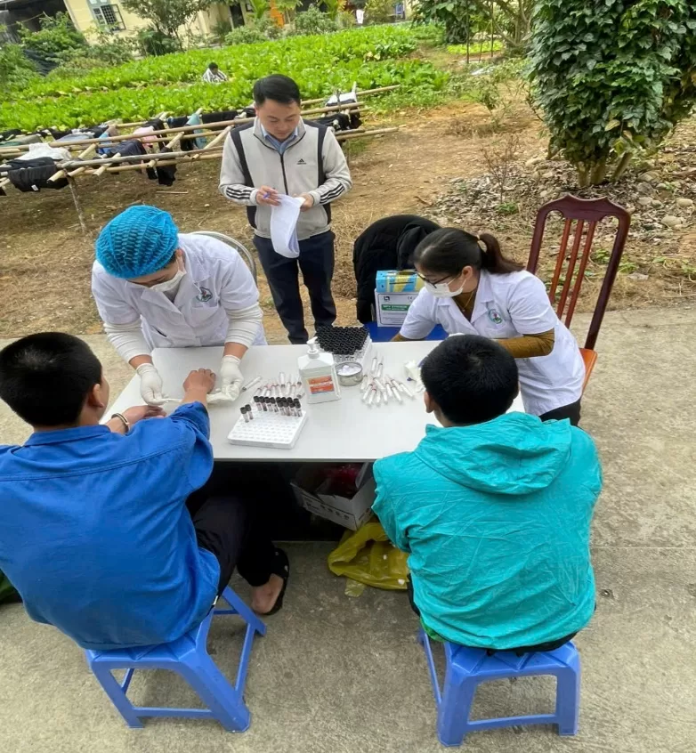 '''''A group of people sitting at a tableAI-generated content may be incorrect.'''''