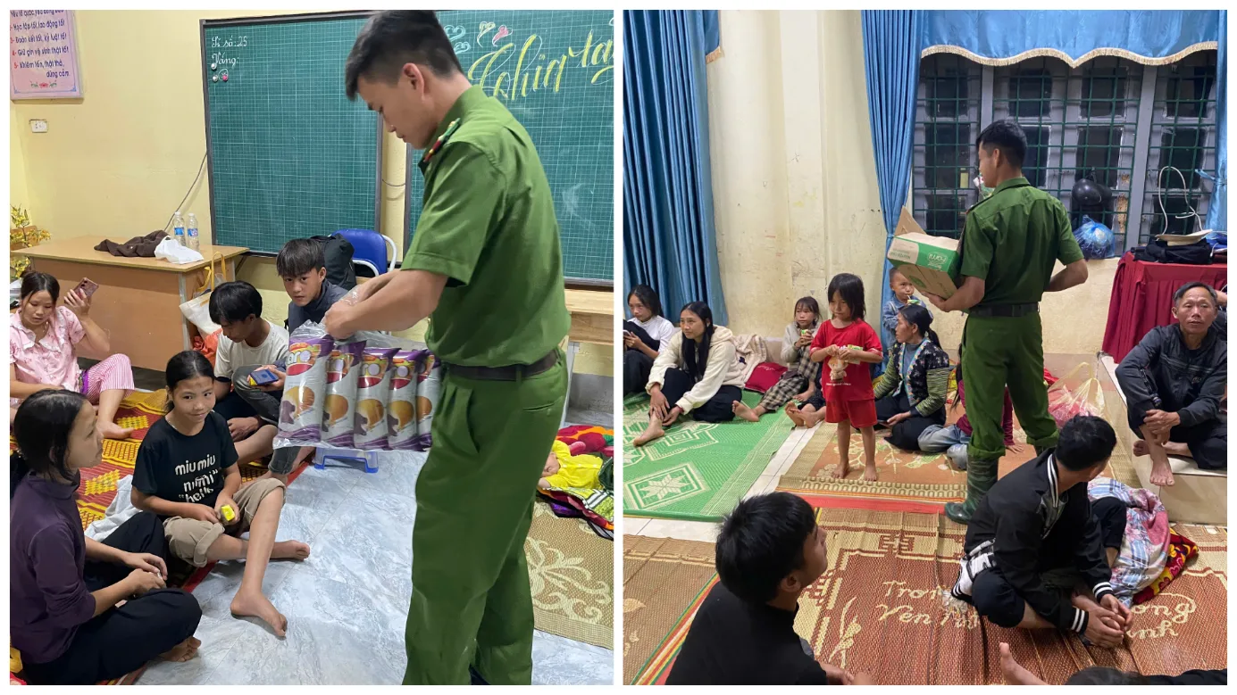 Trao bánh, sữa cho trẻ em tại điểm sơ tán mưa lũ